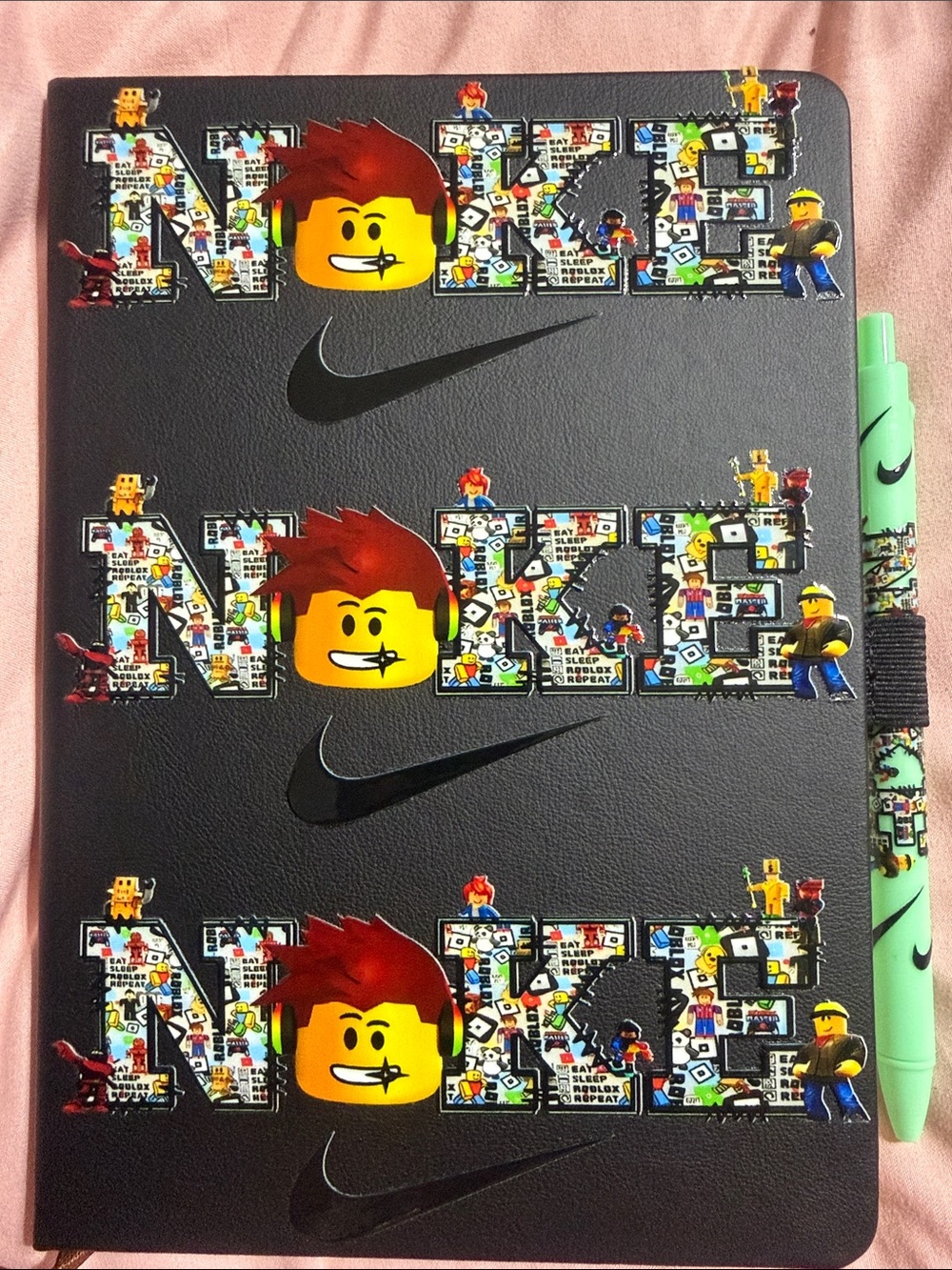 Black Minecraft journal with matching pen.
